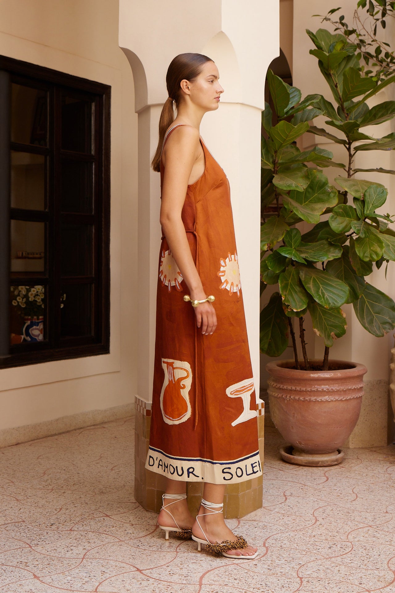 Woman Wearing Alemais Soleil D'amour Silk Midi Dress - Dress LUXAMORE