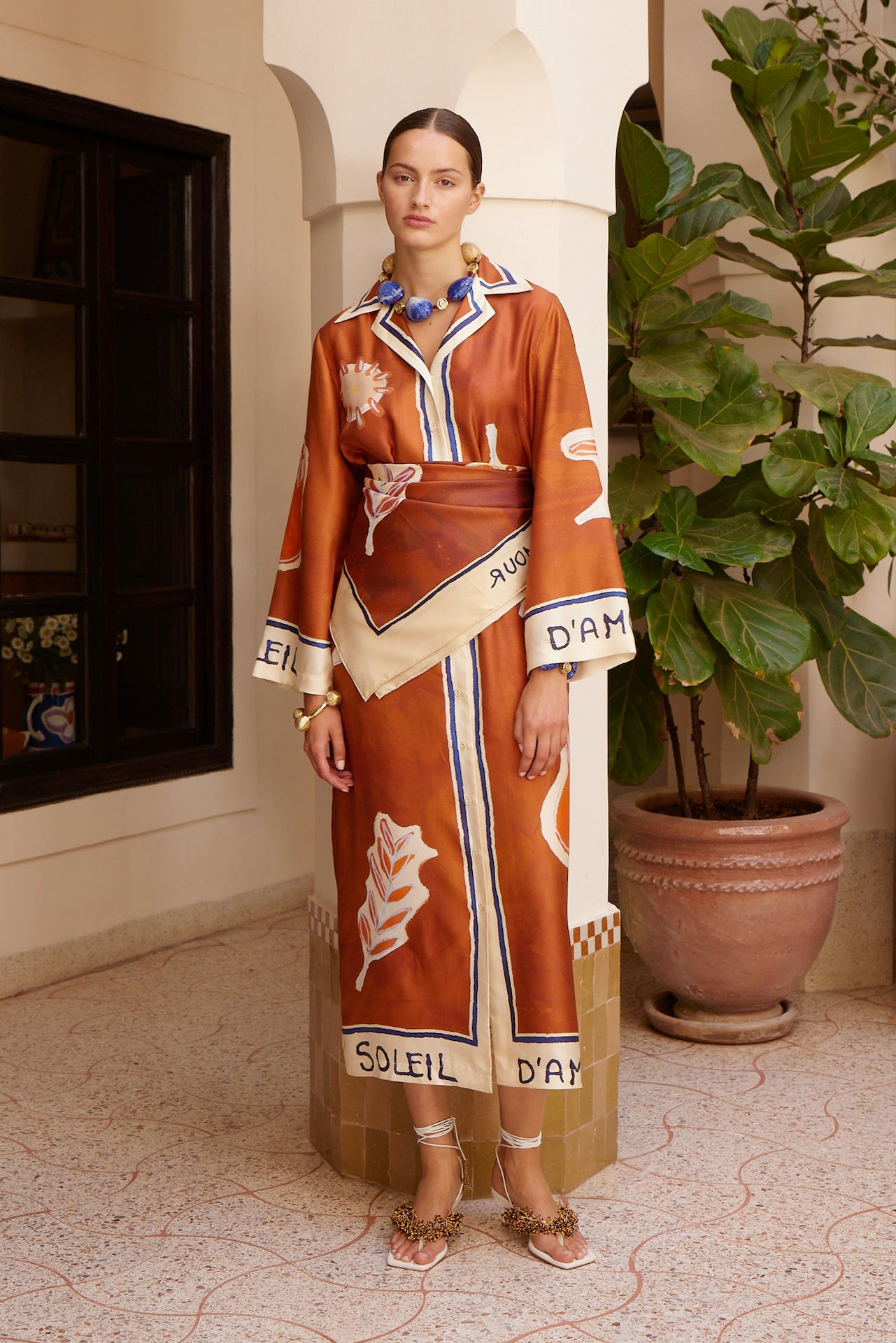 Woman Wearing Alemais Soleil D'amour Silk Shirtdress - Dress LUXAMORE