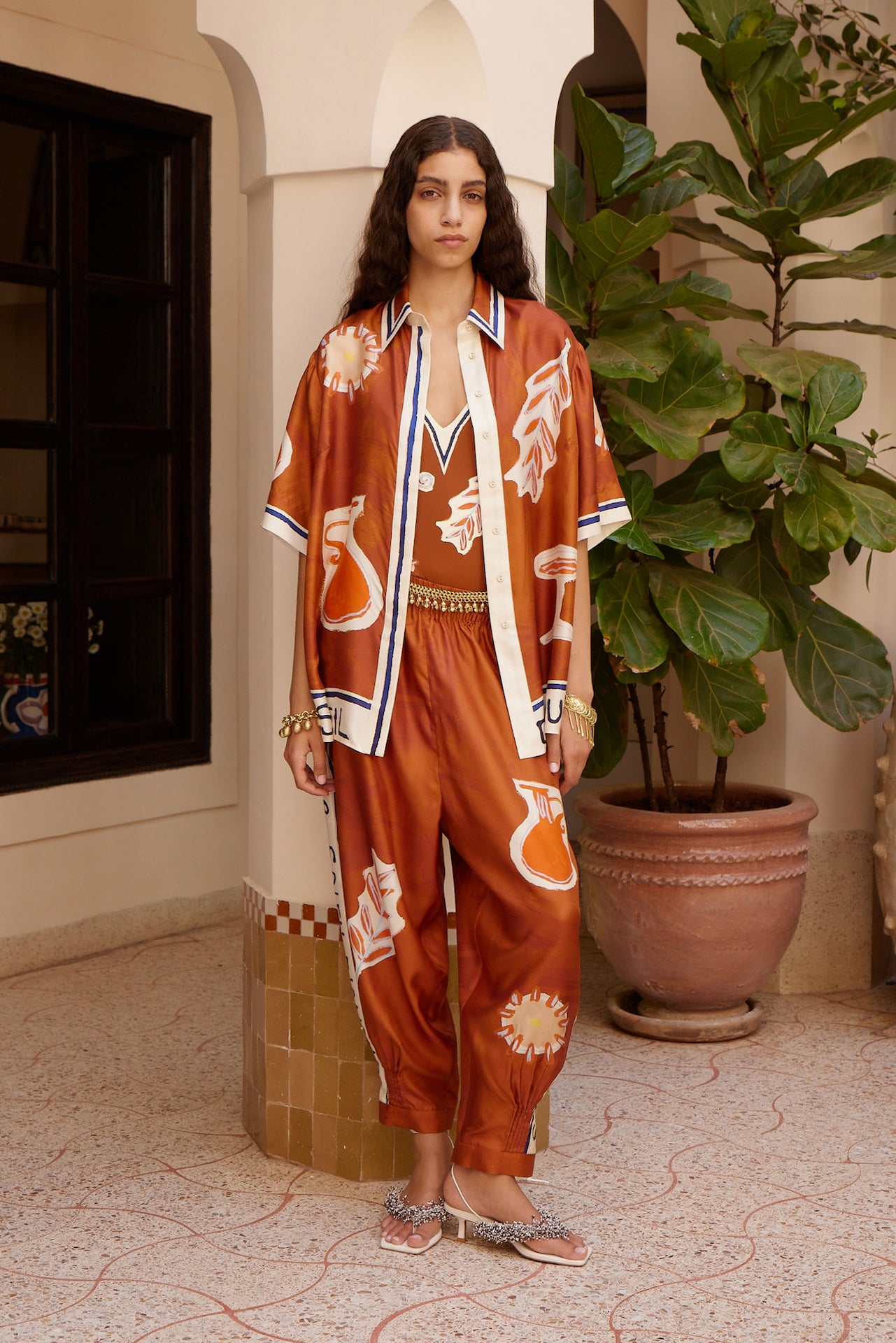 Woman Wearing Alemais Soleil d’Amour Silk Tapered Pants - Pants LUXAMORE