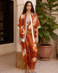 Woman Wearing Alemais Soleil d’Amour Silk Shirt - Top LUXAMORE