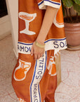 Woman Wearing Alemais Soleil d’Amour Silk Shirt - Top LUXAMORE