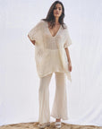 Woman Wearing Estilo Emporio Cuadra Top + Dress Cestino Panna - Dress LUXAMORE
