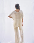 Woman Wearing Estilo Emporio Cuadra Top + Dress Cestino Panna - Dress LUXAMORE