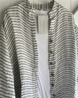 Woman Wearing Estilo Emoporio Manta Mini Linen Dress - Dress LUXAMORE