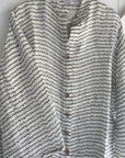 Woman Wearing Estilo Emoporio Manta Mini Linen Dress - Dress LUXAMORE