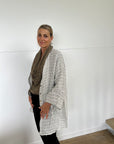 Woman Wearing Estilo Emoporio Manta Mini Linen Dress - Dress LUXAMORE