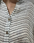 Woman Wearing Estilo Emoporio Manta Mini Linen Dress - Dress LUXAMORE