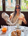 Woman Wearing Estilo Emporio Grand Scarf - Pescatore Natural Chocolate - Scarf LUXAMORE