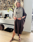 Woman Wearing Estilo Emporio Grand Scarf - Pescatore Natural Chocolate - Scarf LUXAMORE