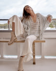 Woman Wearing Estilo Emporio Novo Flare Pant - Brasile Panna White - Pants LUXAMORE