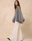 Woman Wearing Estilo Emporio Oboe Linen Shirt - Rete Nero - Top LUXAMORE