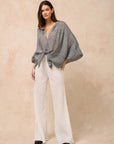 Woman Wearing Estilo Emporio Oboe Linen Shirt - Rete Nero - Top LUXAMORE