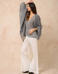 Woman Wearing Estilo Emporio Oboe Linen Shirt - Rete Nero - Top LUXAMORE
