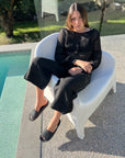 Woman Wearing Estilo Emporio Stevie Top - Black - Tops LUXAMORE