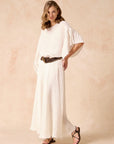 Woman Wearing Estilo Emporio Exclusive Maxi Ruota Skirt in Aida Pesante Black - Skirts LUXAMORE
