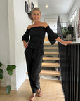 Woman Wearing Estilo Emporio Fiorella Top - Black - Tops LUXAMORE