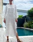Woman Wearing Estilo Emporio Nebbilio Linen Dress - Binario - Dress LUXAMORE