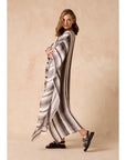 Woman Wearing Estilo Emporio Polla Maxi Kaftan Dark Chocolate Stripe - Dress LUXAMORE