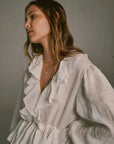 Estilo Emporio Tome Blouse - Tobacco worn by model in natural setting LUXAMORE