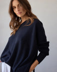 Estilo Emporio Zoe Cashmere - Navy sustainable knit worn by model in studio LUXAMORE