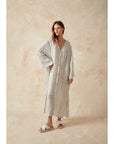 Estilo Emporio Zorba Maxi Linen Dress worn by model in natural setting LUXAMORE