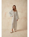 Estilo Emporio Zorba Maxi Linen Dress worn by model in natural setting LUXAMORE
