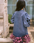 Floral Cosmos Denim Boho Embroidered Overshirt worn by model in natural setting LUXAMORE