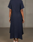 Linen Dress Bias Cut Maxi Made in Italy - Navy worn by model in natural setting LUXAMORE