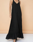 Linen Dress Black Maxi Lace Back Made in Italy worn by model in natural setting LUXAMORE