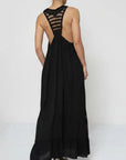 Linen Dress Black Maxi Lace Back Made in Italy worn by model in natural setting LUXAMORE