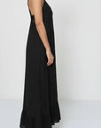 Linen Dress Black Maxi Lace Back Made in Italy worn by model in natural setting LUXAMORE