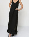 Linen Dress Black Maxi Lace Back Made in Italy worn by model in natural setting LUXAMORE
