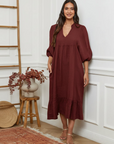 Linen dress balloon sleeve bordeaux worn by woman