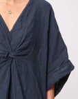Woman Wearing Linen Dress V-neck Knot Front Midi Made in Italy Navy - Dress LUXAMORE