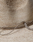 Woman Wearing Made in Mada Hat AZIZ - hat LUXAMORE