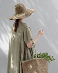 Woman Wearing Made in Mada Hat AZIZ - hat LUXAMORE