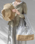 Woman Wearing Made in Mada Hat AZIZ - hat LUXAMORE