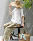 Woman Wearing Made in Mada Hat AZIZ - hat LUXAMORE