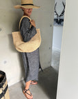 Woman Wearing Made in Mada Hat Gaston - hat LUXAMORE
