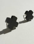 Woman Wearing Mingled Black Cross Stud Earrings - Small Cross Earrings, Minimalist - Earings LUXAMORE