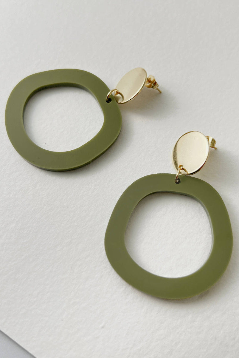 Woman Wearing Mingled Charlie Olive Green and Gold Dangle Earrings - Earings LUXAMORE