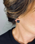 Woman Wearing Mingled Black Cross Stud Earrings - Small Cross Earrings, Minimalist - Earings LUXAMORE