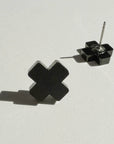 Woman Wearing Mingled Black Cross Stud Earrings - Small Cross Earrings, Minimalist - Earings LUXAMORE