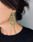 Woman Wearing Mingled RILEY Dangle Earrings in Olive Green - Earings LUXAMORE