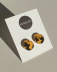 Woman Wearing Mingled Tortoise Shell Round Stud Earrings - 15mm - Earings LUXAMORE