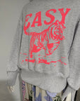 Miss Goodlife Easy Tiger Sweater Made in Italy worn by model in natural setting LUXAMORE