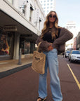 Woman Wearing Mode & Affaire Cascade Fur Coat - Portobello - jacket LUXAMORE