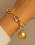 Woman Wearing Orna Curio Golden Years Gold Plated Bracelet - Bracelets LUXAMORE