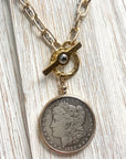 Pre Order Coin necklace boutique jewelry crystal handmade mixed metal worn by model in natural setting LUXAMORE