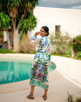 Pre Order Miss Goodlife Midi Dress Green Garden worn by model in natural setting LUXAMORE